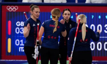 Great Britain curlers shake hands
