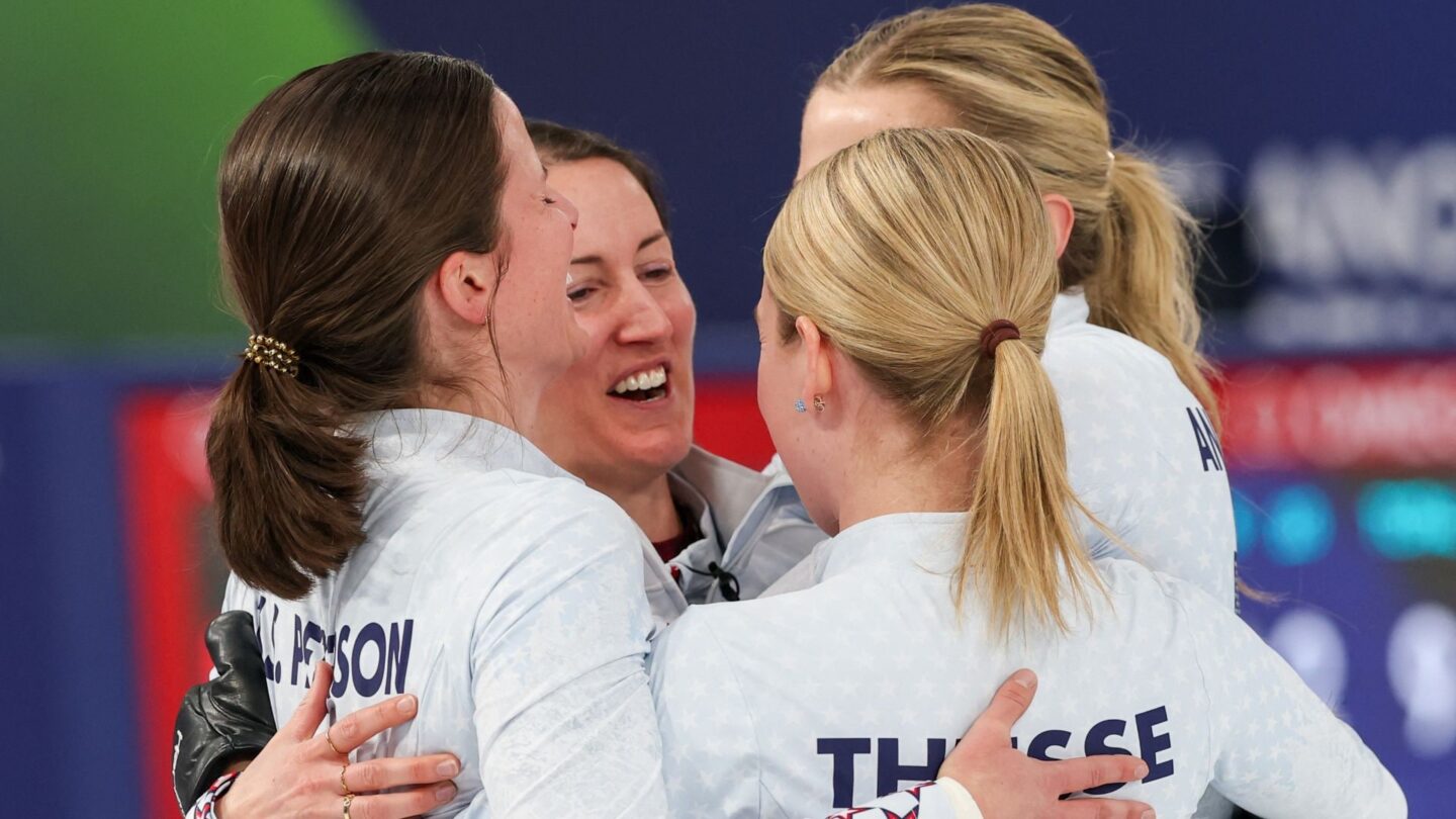 <i>NBC Olympics</i><br/>U.S. curling team hugs and celebrates win