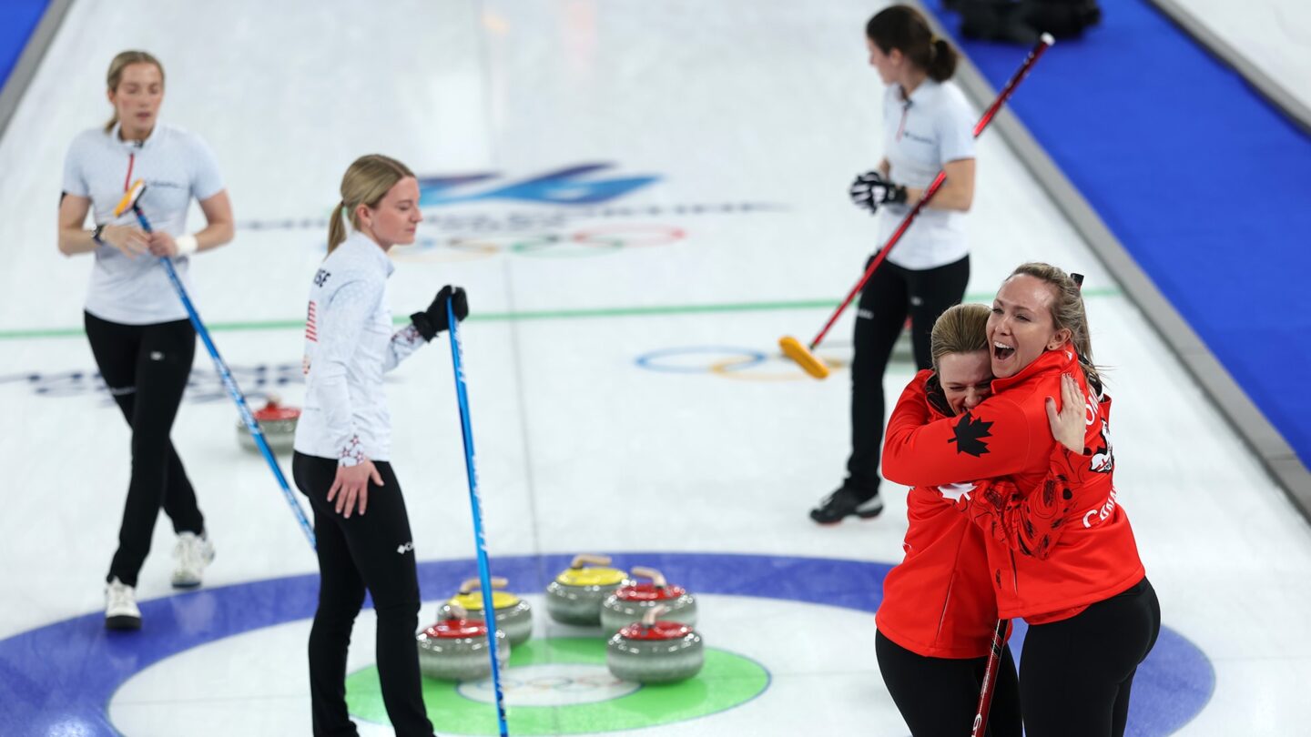 <i>NBC Olympics</i><br/>Curlers look over rocks