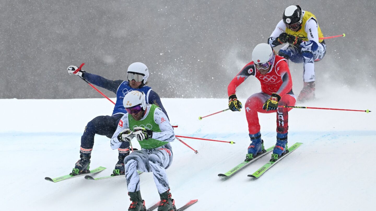 <i>NBC Olympics</i><br/>Skiers race through the ski cross course