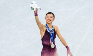 Olympian Kaori Sakamoto celebrates after her performance