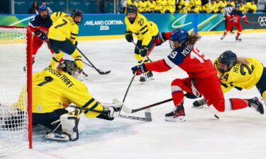 Swedish women's hockey goalie Ebba Traff Svensson stops a shot against Czechia in the quarterfinals of the 2026 Olympics.