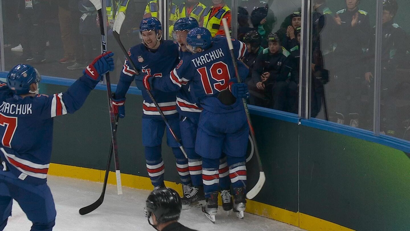 U.S. men's hockey player Jack Eichel celebrates after scoring against Denmark at the 2026 Olympics.
