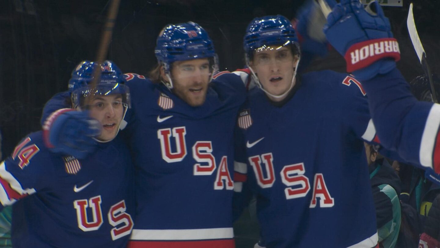U.S. men's hockey player Noah Hanifin celebrates after scoring against Denmark at the Olympics.