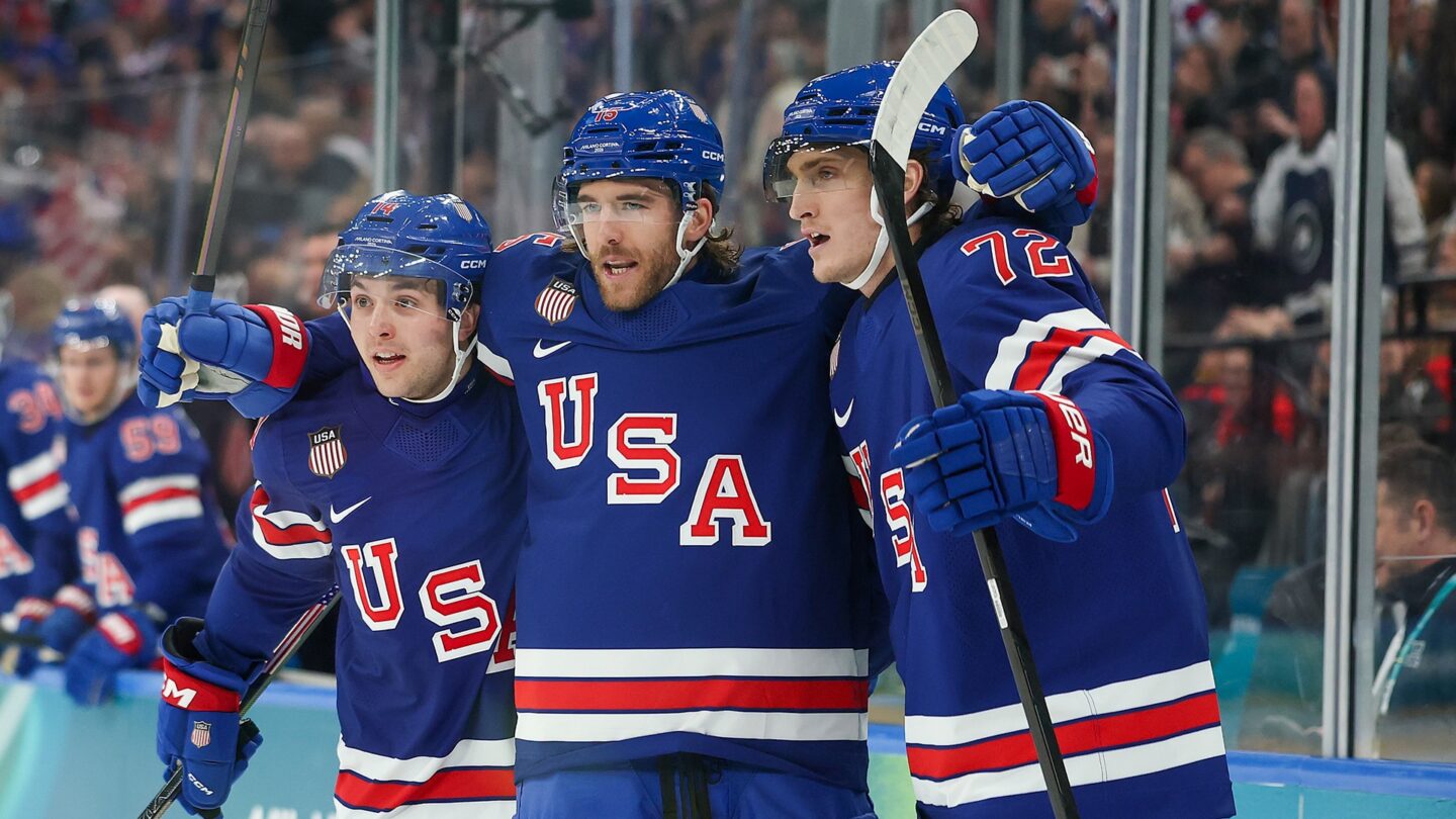 United States men's hockey celebrates a goal.