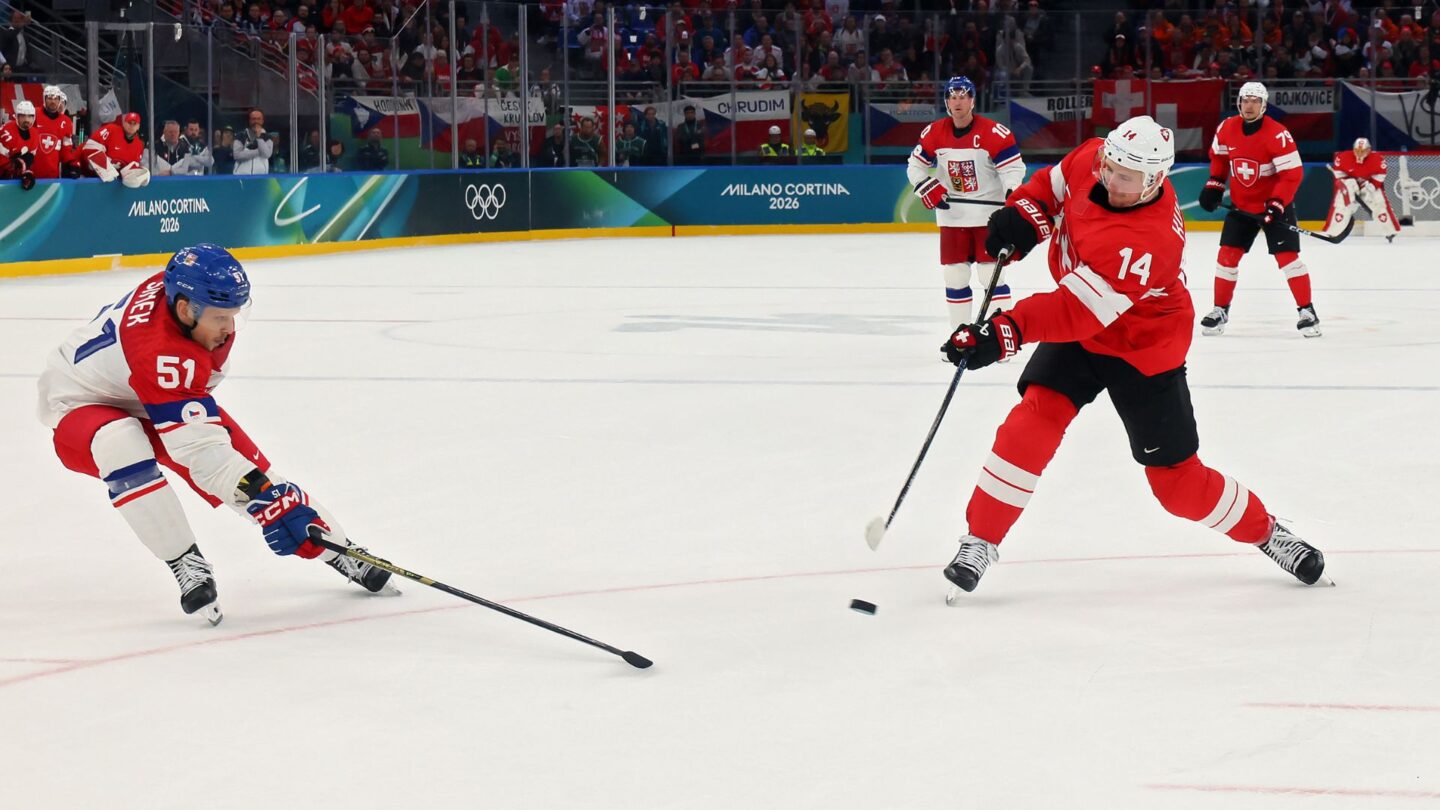 Switzerland's Dean Kukan shoots and scores during overtime to propel the his team over Czechia in the group stage matchup at the 2026 Olympics.
