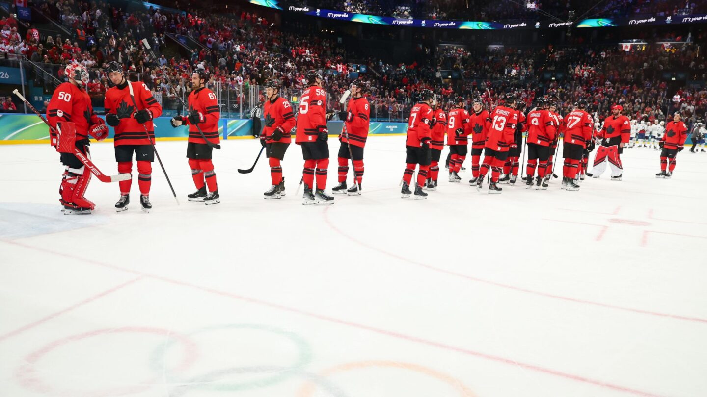 The entire Canadian team celebrates its win.