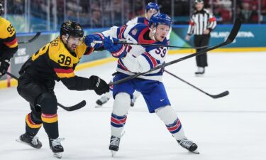 Jake Guentzel shoots and scores against Germany in a group stage win at the 2026 Milan Cortina Olympics.