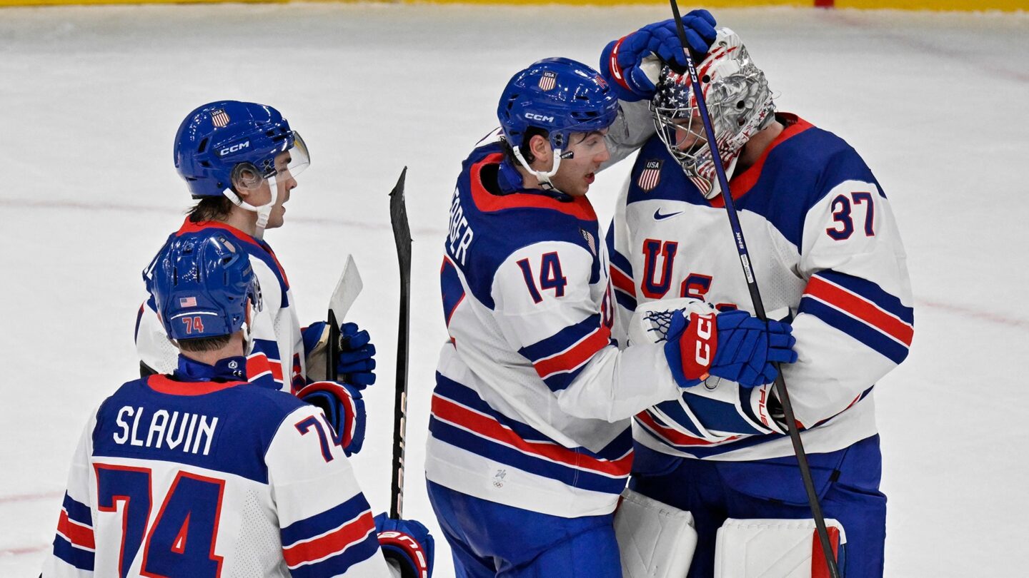 U.S. men's hockey celebrates its win against Germany.