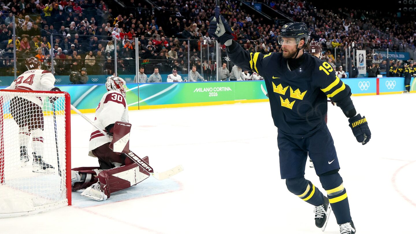 <i>NBC Olympics</i><br/>Sweden's Adrian Kempe celebrates after scoring against Latvia in the men's hockey qualification playoffs at the 2026 Olympics.