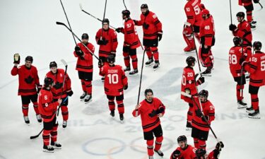 The Canadian men's hockey team celebrates after defeating Finland in the men's Olympic hockey semifinal at the 2026 Milan Cortina Olympics.