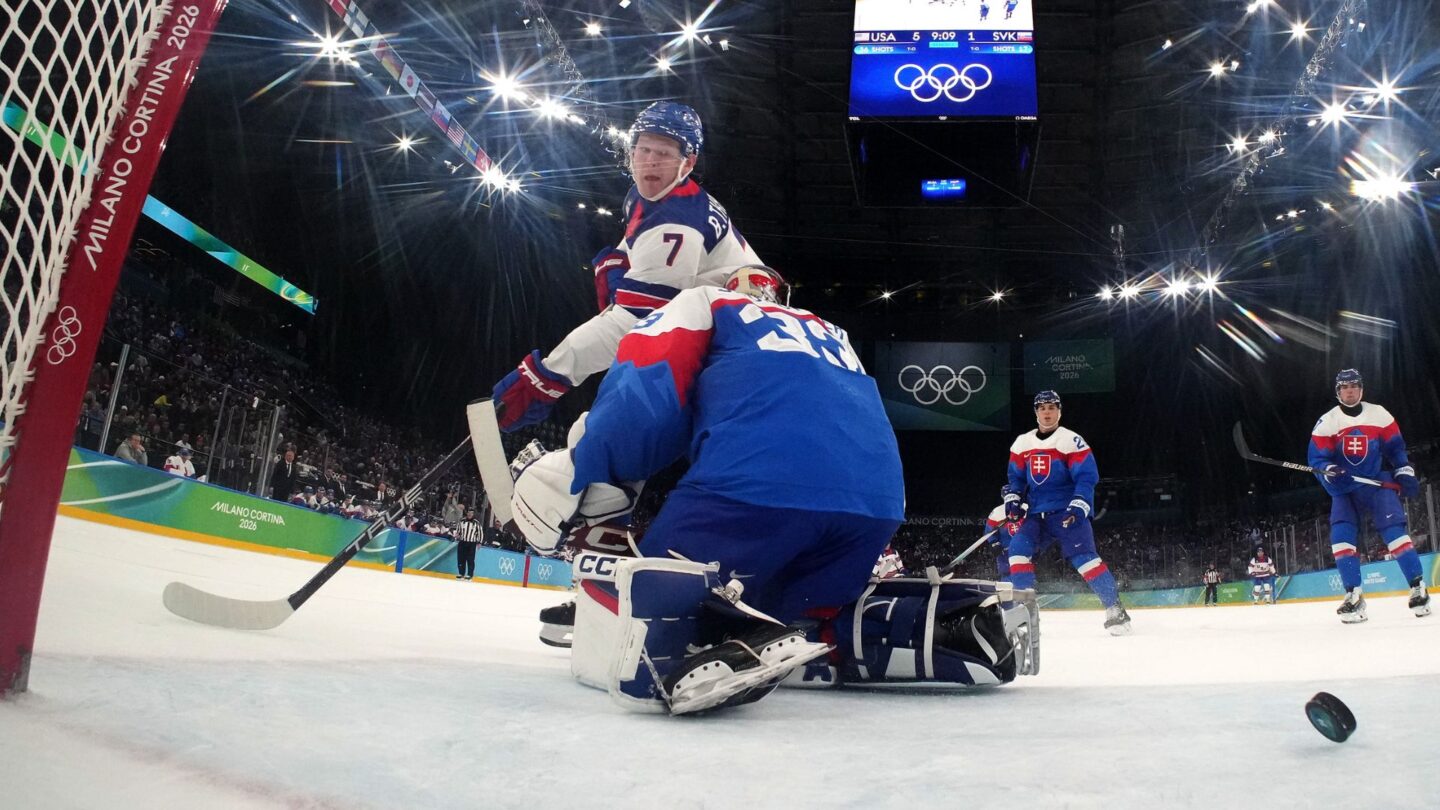 <i>NBC Olympics</i><br/>Goalie camera view of U.S. men's hockey player Brady Tkachuk scoring over Slovakia in the men's semifinal matchup at the 2026 Milan Cortina Olympics.