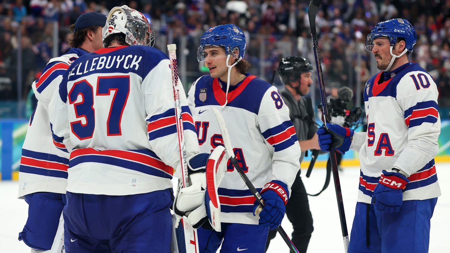 <i>NBC Olympics</i><br/>The U.S. men's hockey team celebrates on the ice after defeating Slovakia in the Olympic semifinal round.