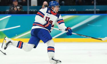 U.S. men's hockey player Jack Hughes shoots on goal during the team's win over Slovakia in the Olympic semifinal round.
