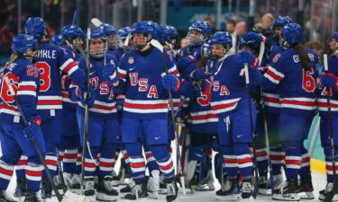 The U.S. women's hockey team on the ice during competition at the 2026 Milan Cortina Olympics.