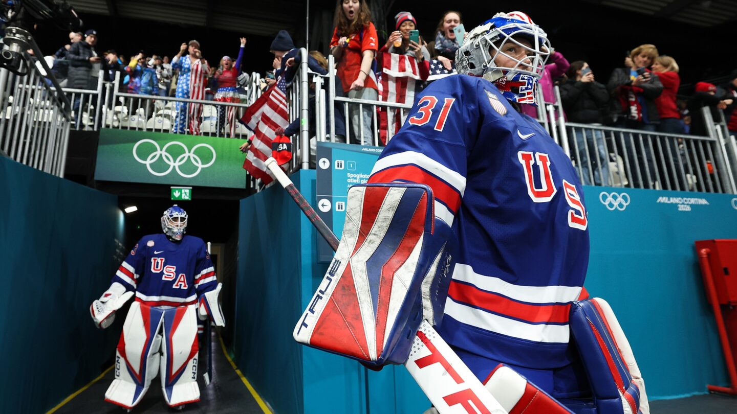 U.S. women's hockey goalies Aerin Frankel and Gwyneth Philips enter the arena to take the ice at the 2026 Winter Olympics.
