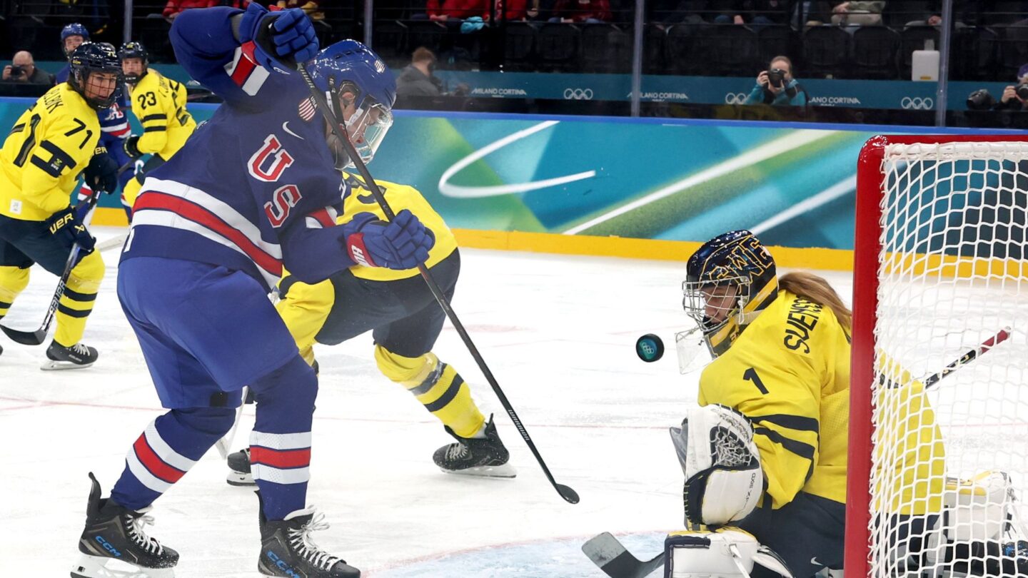U.S. women's hockey player Abbey Murphy shoots and scores during semifinal victory of Sweden.