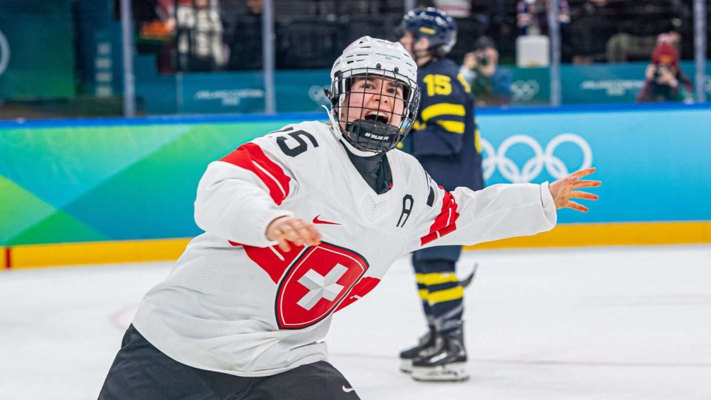<i>NBC Olympics</i><br/>Switzerland's women's hockey player Alina Muller celebrates after scoring the game-winning goal to secure bronze in the Olympic matchup with Sweden.