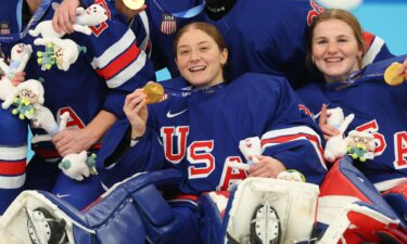Goaltender Aerin Frankel celebrates winning gold against Canada
