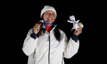 Elana Meyers Taylor winning gold.