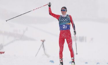 Jens Luraas Oftebro crosses the finish line