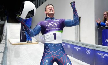 Matt Weston celebrates winning gold