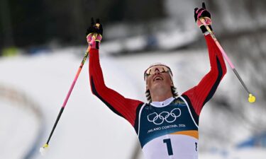 Johannes Hoesflot Klaebo celebrates winning Olympic gold