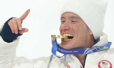 Alex Ferreira with his gold medal.