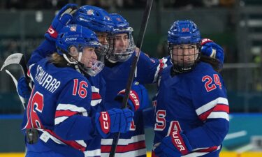 Team USA celebrates a goal.