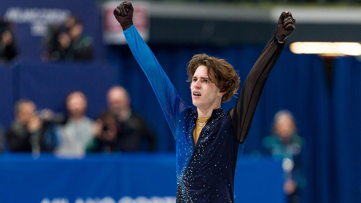Mikhail Shaidorov celebrates his gold medal.