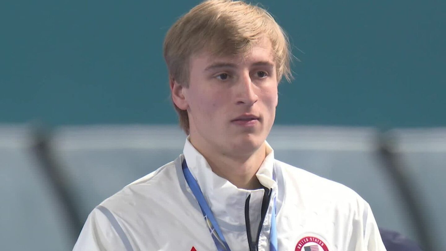 Jordan Stolz taking in the national anthem after winning the 500m