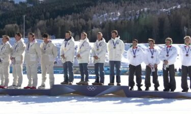 Johannes Hoesflot Klaebo during the Norwegian national anthem.