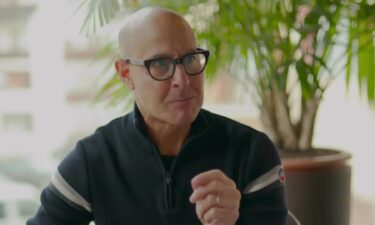 Stanley Tucci trying more food in Italy.