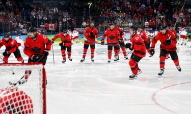 Canada men's hockey celebrates their win.