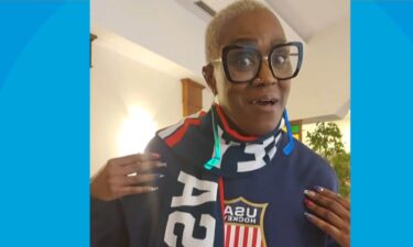 Charone Gray Edwards shows off her clothes to the camera