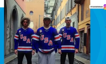The Winn brothers pose in their Team USA jerseys