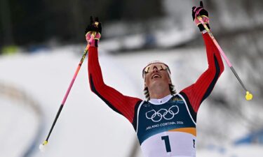 Johannes Hoesflot Klaebo celebrates his record-breaking sixth gold medal of the Milan Cortina Olympics.
