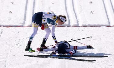 Cross country skiers compete as hard as possible until reaching the finish line