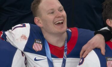 Team USA sings the national anthem