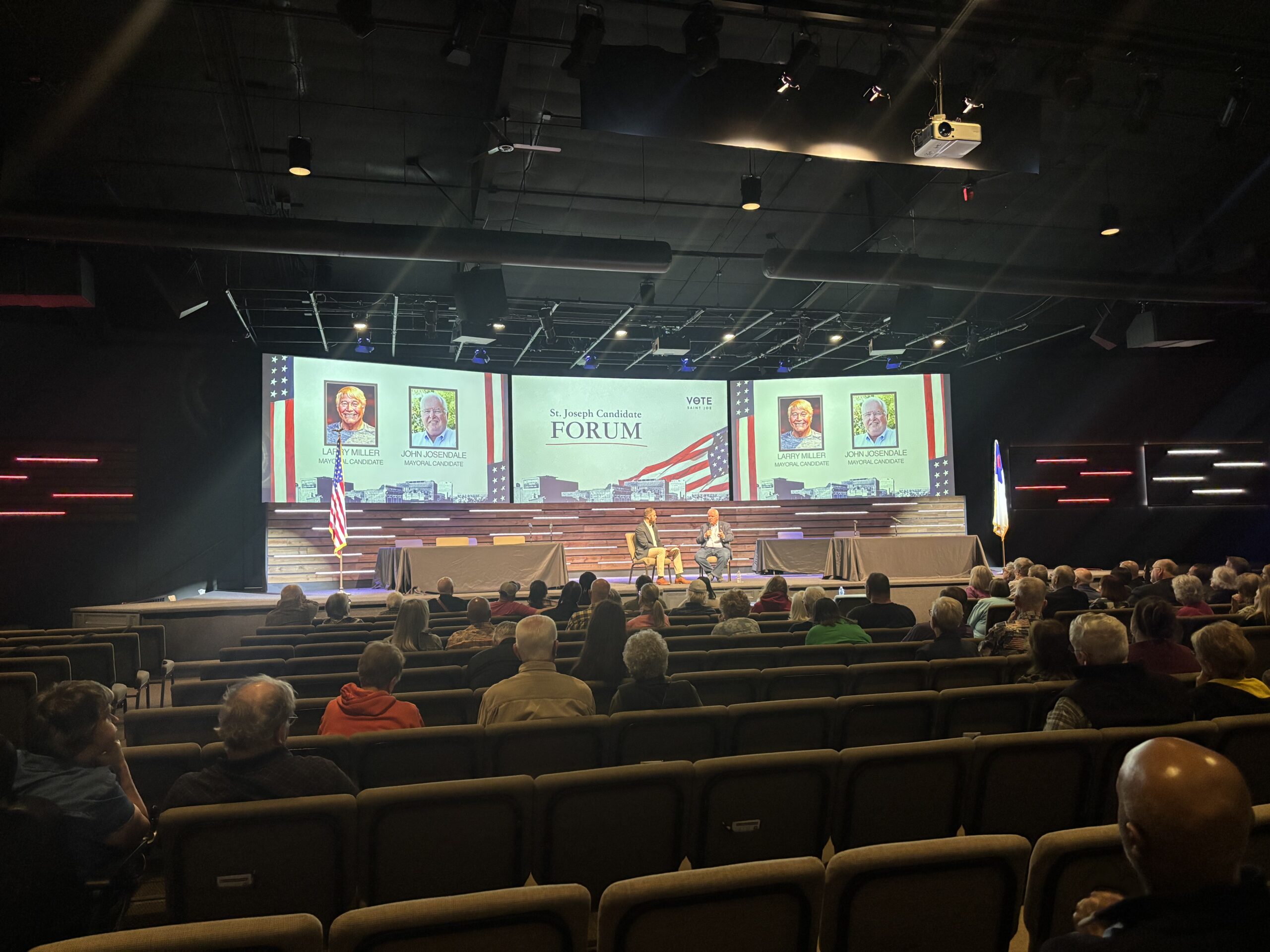 John Josendale speaking to the community at city council and mayoral forum.