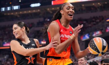 Los Angeles Sparks's Kelsey Plum (10) guards Las Vegas Aces' A’ja Wilson (22) on Saturday