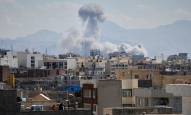 A damaged building is seen after an Israeli airstrike in a southern suburb of Beirut