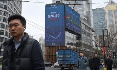 A screen shows the commodity futures for crude oil in the Jing'an district of Shanghai on March 2.