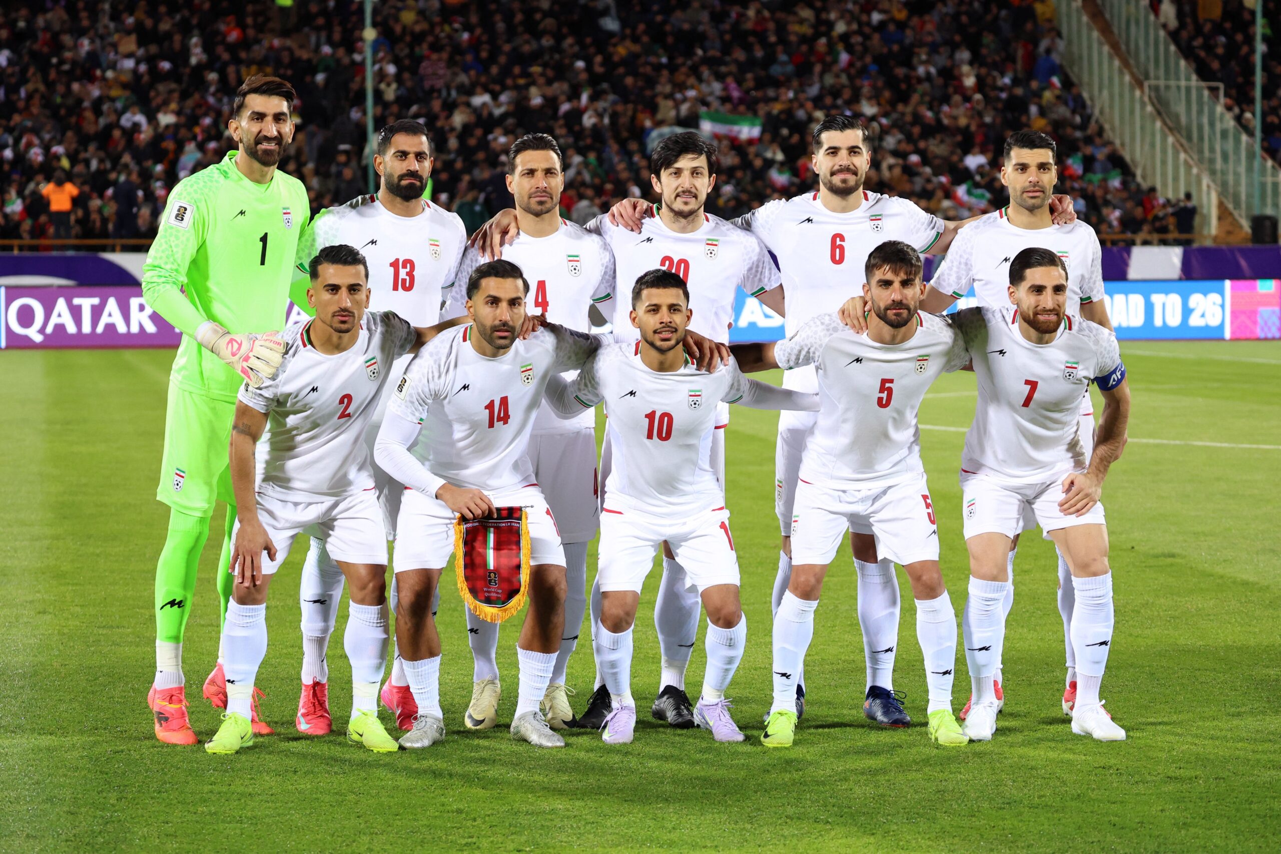 <i>Atta Kenare/AFP/Getty Images via CNN Newsource</i><br/>Iran supporters cheer for their team during a match in Tehran in June.