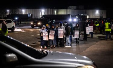 Workers and supporters picket during a strike at the JBS Greeley meatpacking facility in Greeley