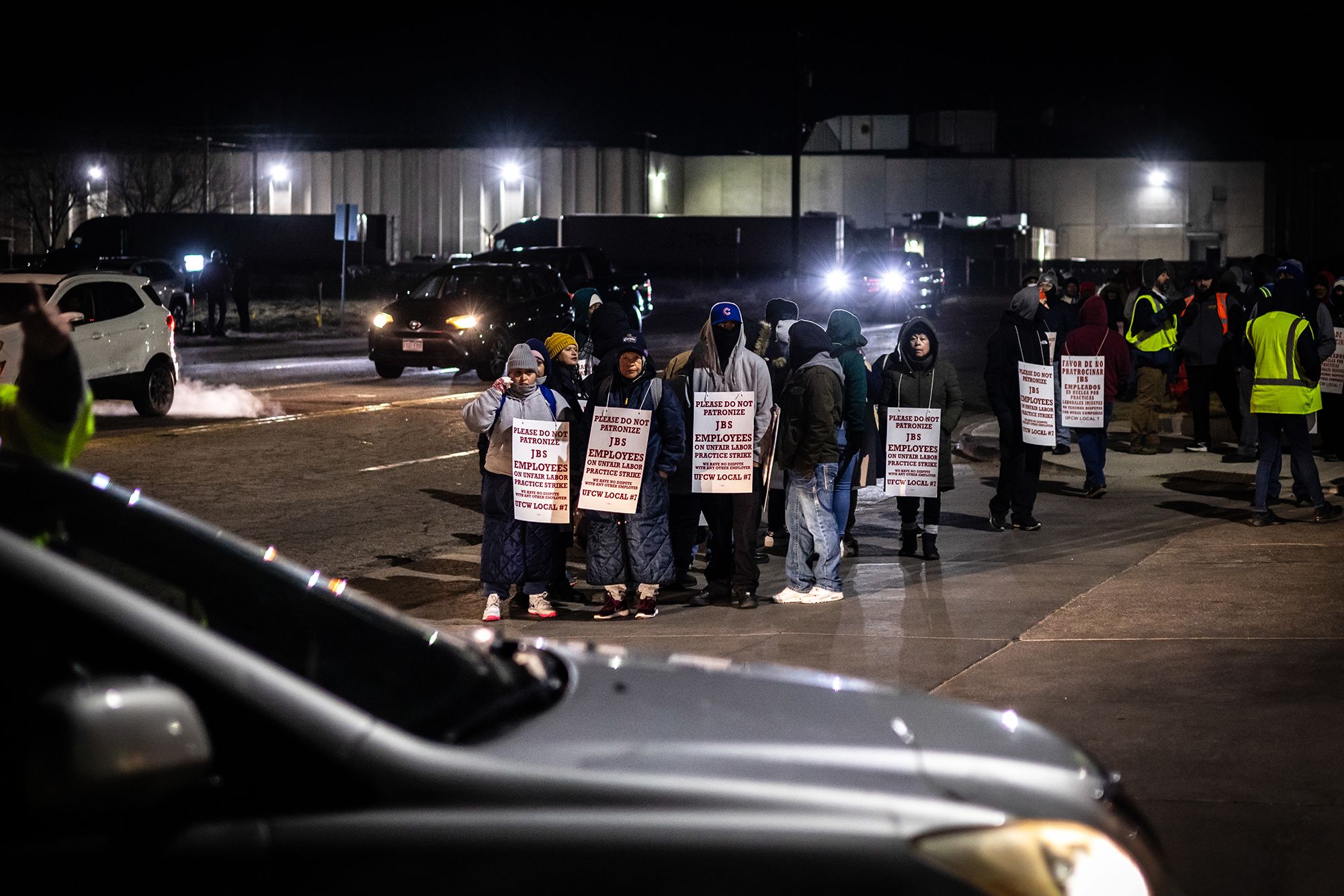 <i>Chet Strange/Bloomberg/Getty Images via CNN Newsource</i><br/>Workers and supporters picket during a strike at the JBS Greeley meatpacking facility in Greeley