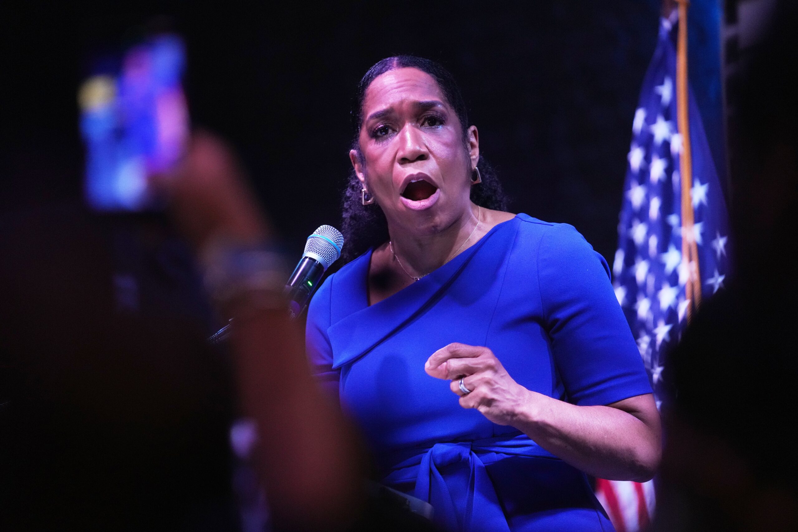 <i>Christopher Dilts/Bloomberg/Getty Images via CNN Newsource</i><br/>Attendees react to incoming results during a primary election night event with Juliana Stratton