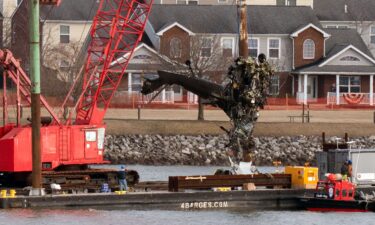 An aircraft taxis on the runway at Washington Reagan National Airport on January 29.