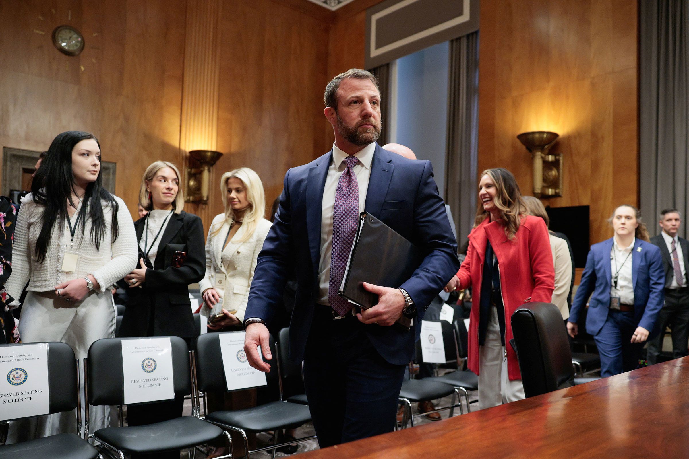 <i>Evan Vucci/Reuters via CNN Newsource</i><br/>Sen. Markwayne Mullin wipes tears as he speaks about his son during testimony on Capitol Hill Wednesday.