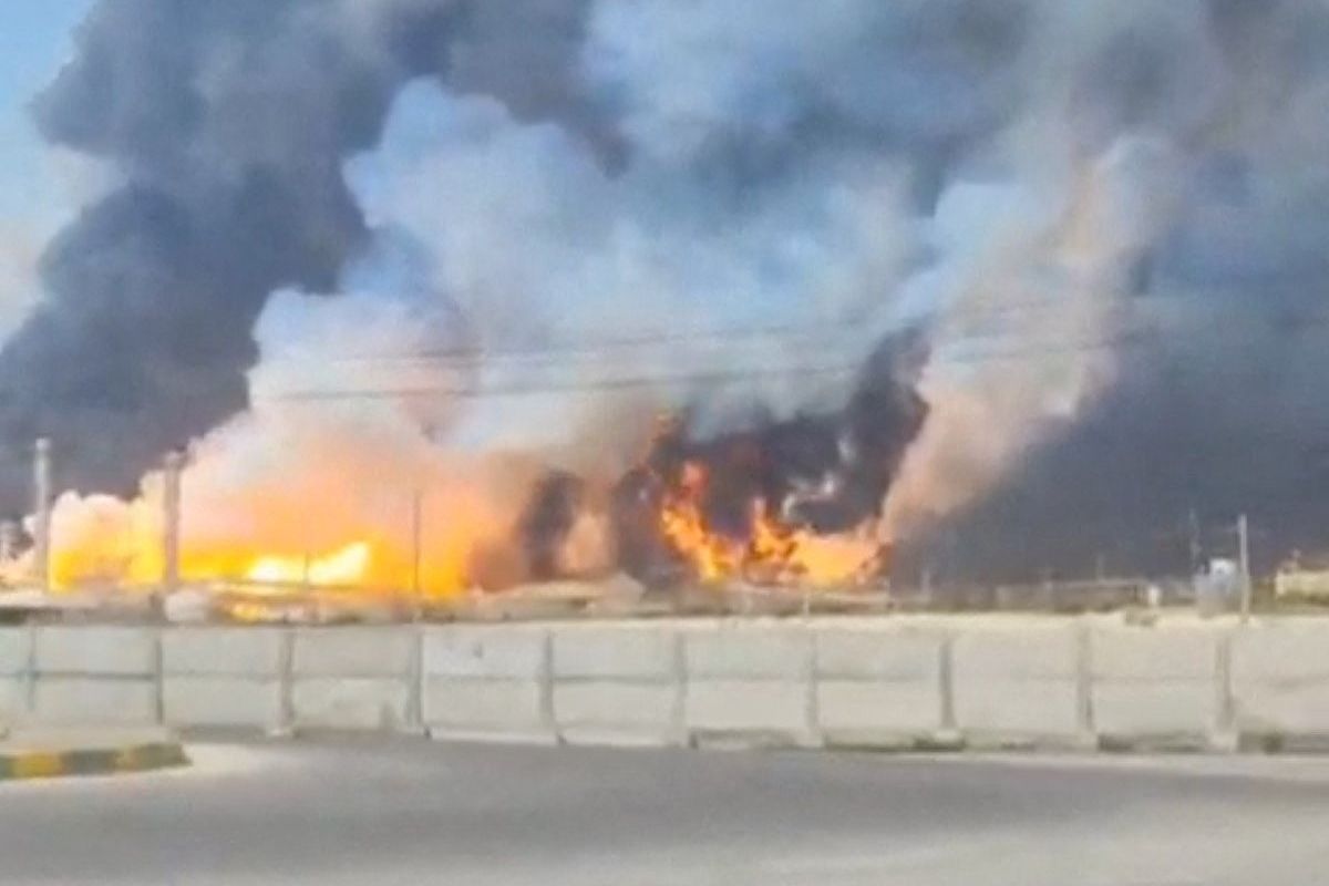 <i>Reuters via CNN Newsource</i><br/>Smoke and fire rise near the South Pars gas field following an attack in Bushehr Province